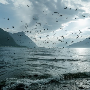 many birds flew over the water and mountains, in the style of documentary-style, 32k uhd, samyang 14mm f2.8 if ed umc aspherical, seaside vistas, captivating documentary photos