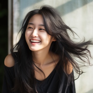 Chinese young woman with long hair smiling at viewer